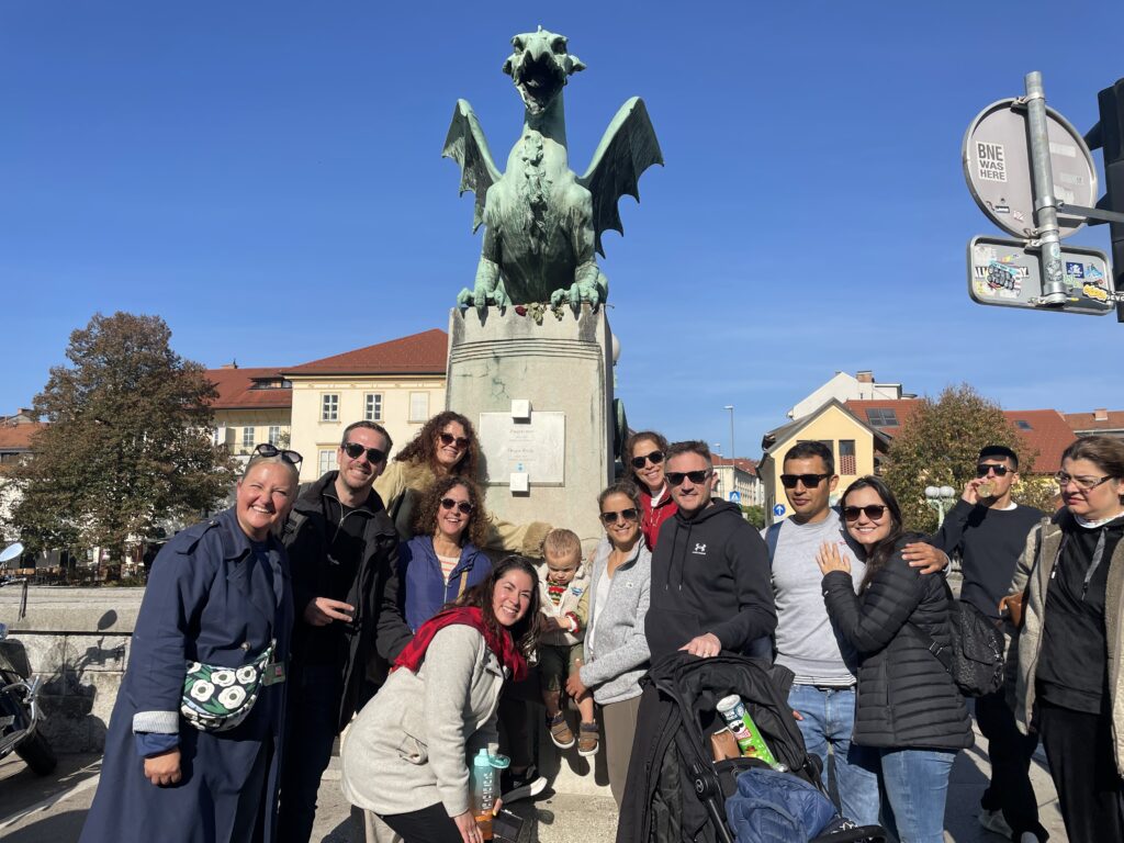 Private group on a guided walking tour at Dragon Bridge in Ljubljana